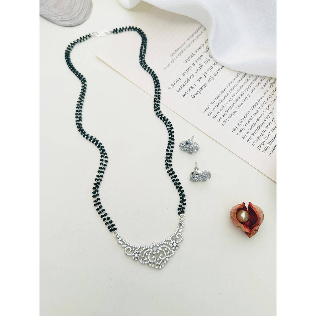 Abdesigns American Diamond Studded Beaded Mangalsutra with Pair Of Earrings (Set of 2) White
