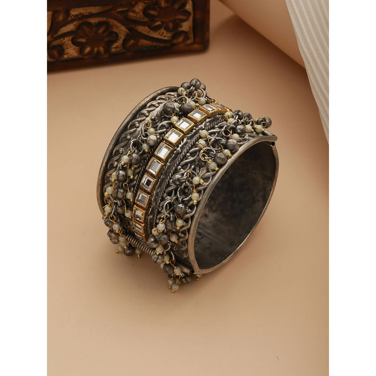 Aatmana Silver Plated Oxidised Kundan Studded & Pearl Beaded Bangle Style Bracelet