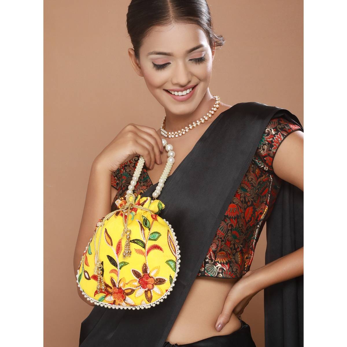 Aatmana Yellow Multi-coloured Leaf Pattern Potli Bag · Free Size