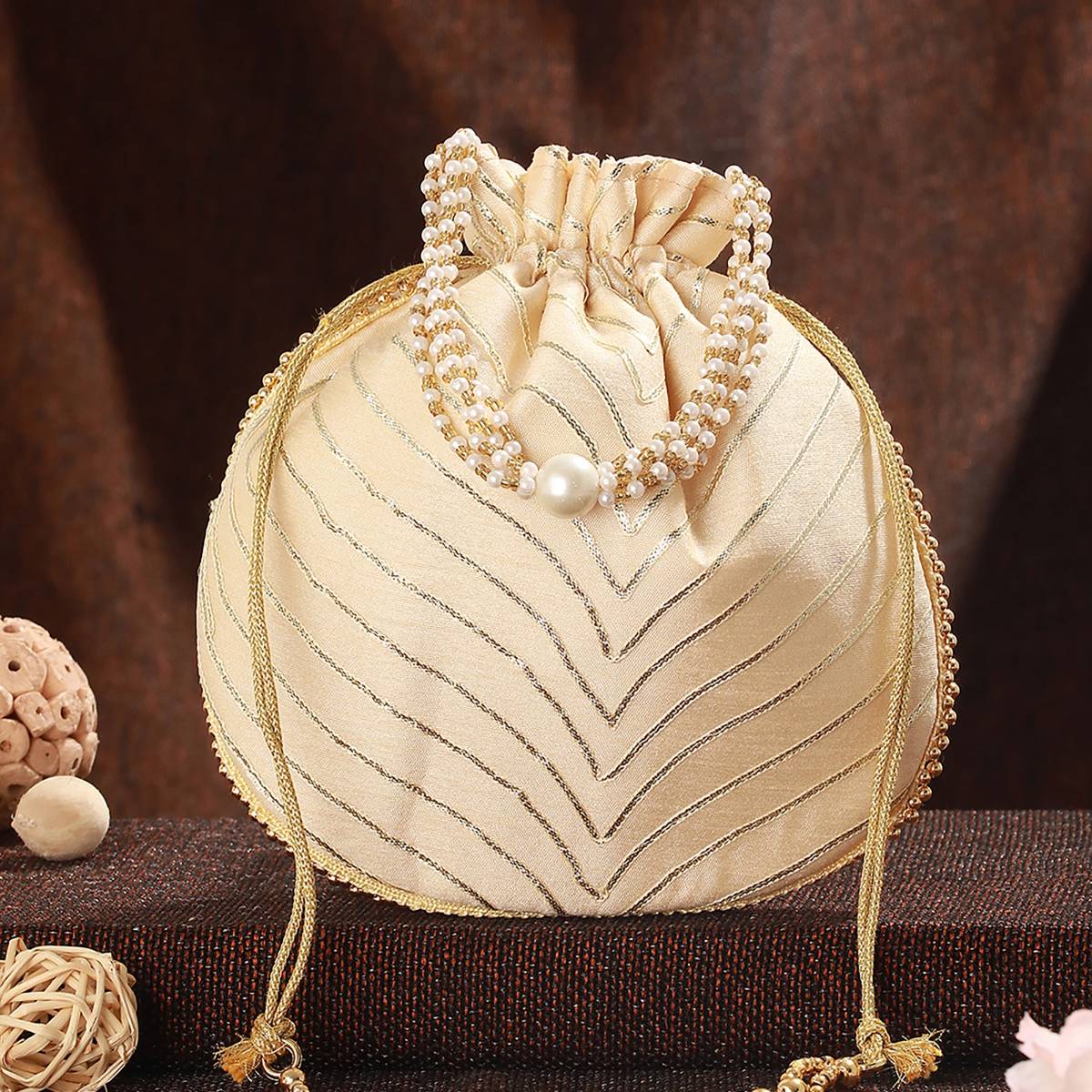 Aatmana Gold Embellished Potli Bag · One Size