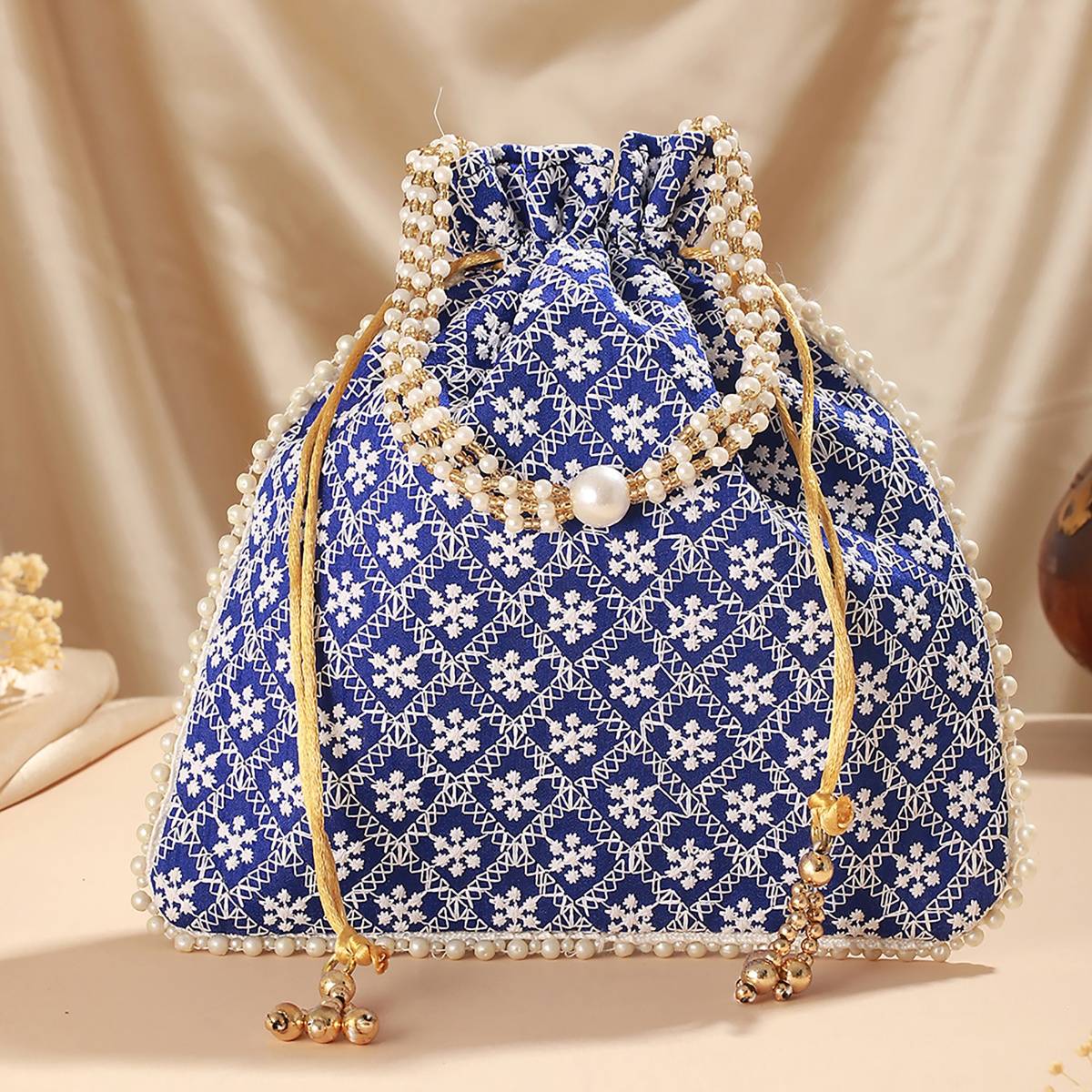 Aatmana Blue & Gold Toned Chikan Embroidered Work Potli Bag · One Size
