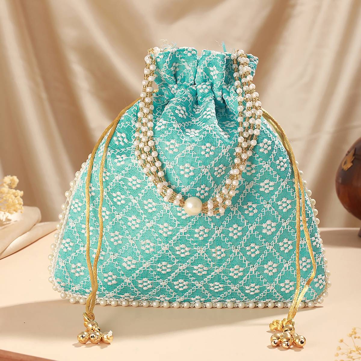 Aatmana Turquoise Blue & Gold Toned Chikan Embroidered Work Potli Bag