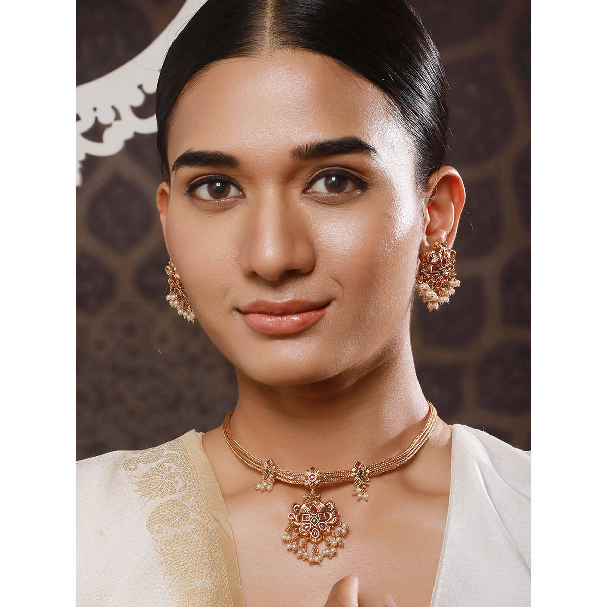 Aatmana 22K Gold Plated Ruby and Green Kemp Stone Studded Temple Jewellery Set