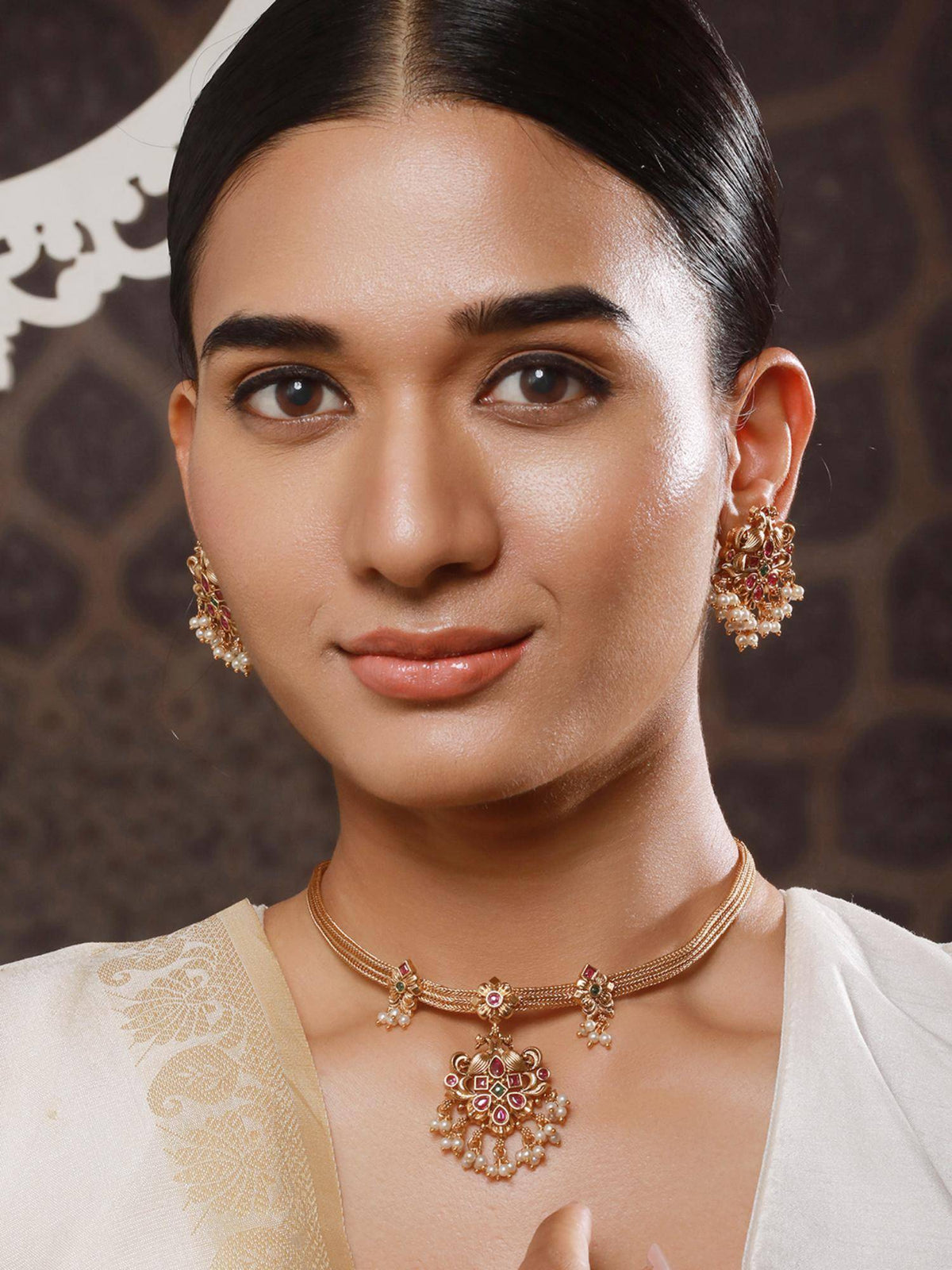 Aatmana 22K Gold Plated Ruby And Green Kemp Stone Studded Peacock Shaped Temple Jewellery Set · One Size