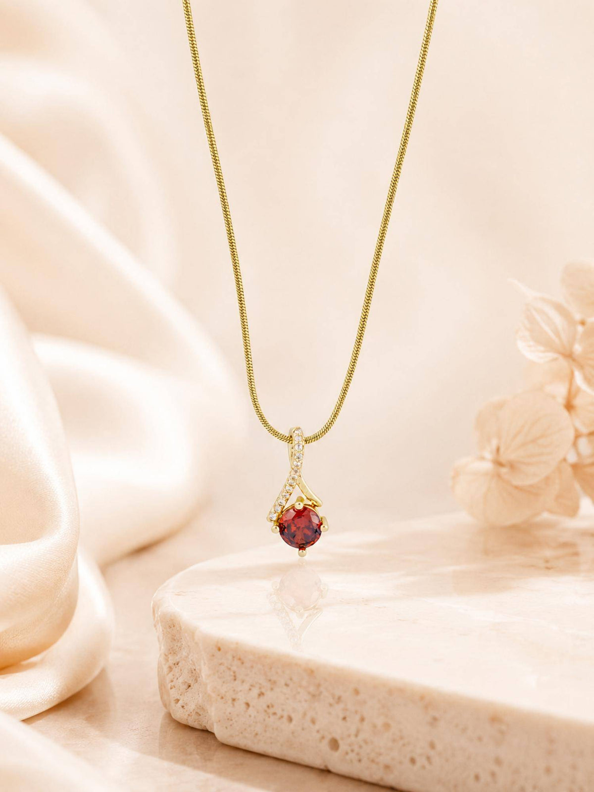 AANURA 18K Gold Plated Red Crystal Swirl Pendant Necklace