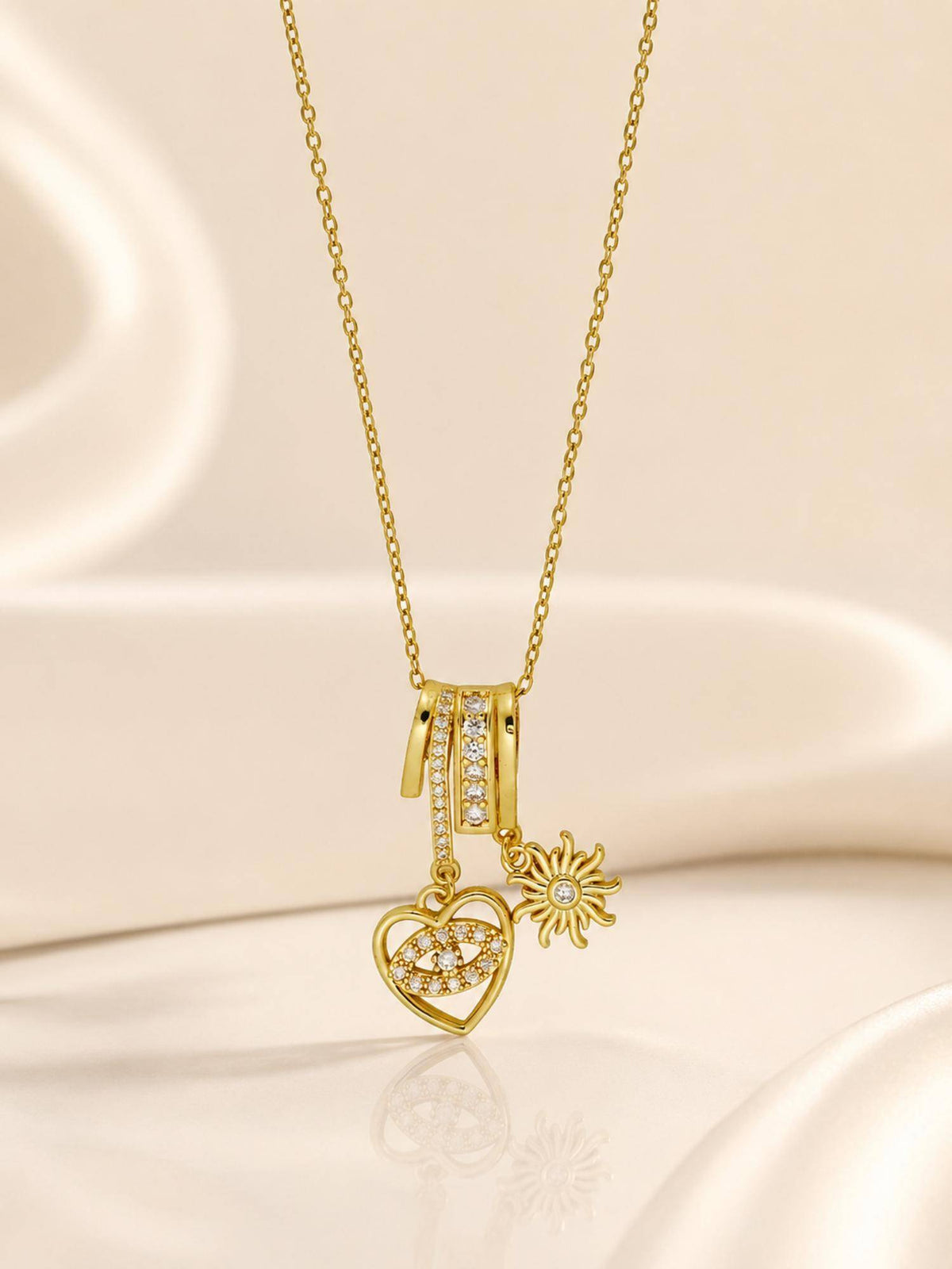 AANURA 18K Gold Plated Heart Eye And Sun Charm Necklace