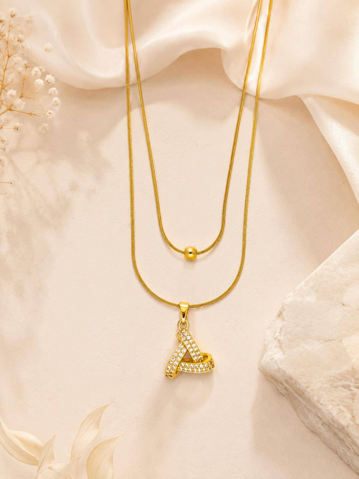 AANURA 18K Gold Plated Crystal Ribbon Loop Layered Necklace