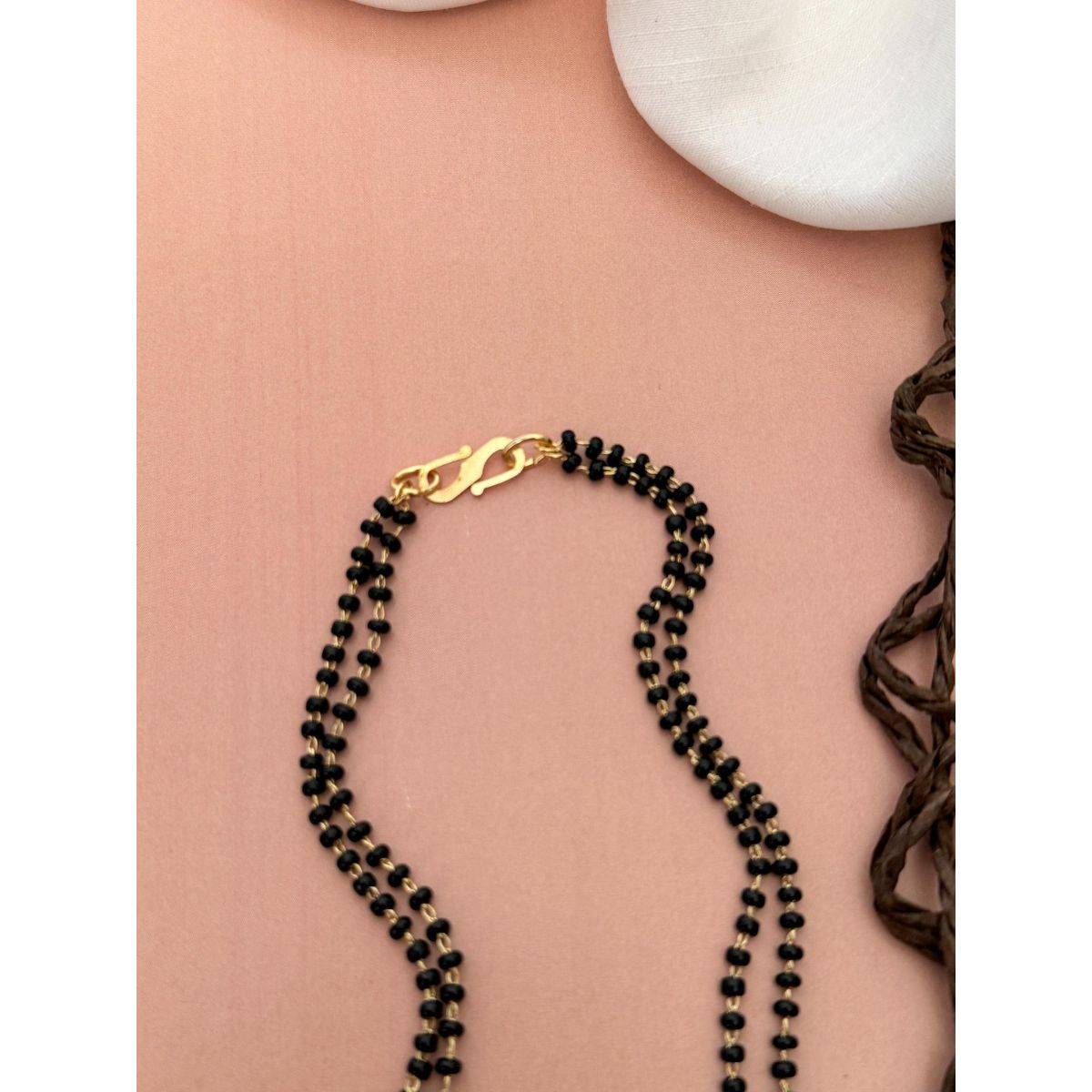 Abdesigns Gold Plated American Diamond Studded And Beaded Mangalsutra With Earrings White