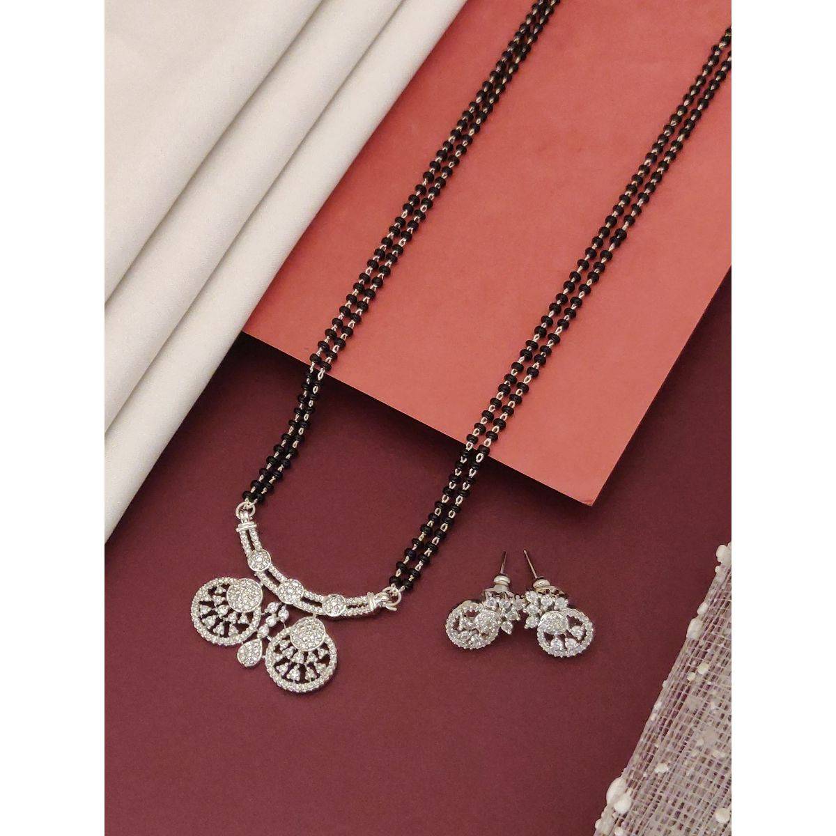 Abdesigns Silver Plated American Diamond Studded And Beaded Mangalsutra With Earrings White