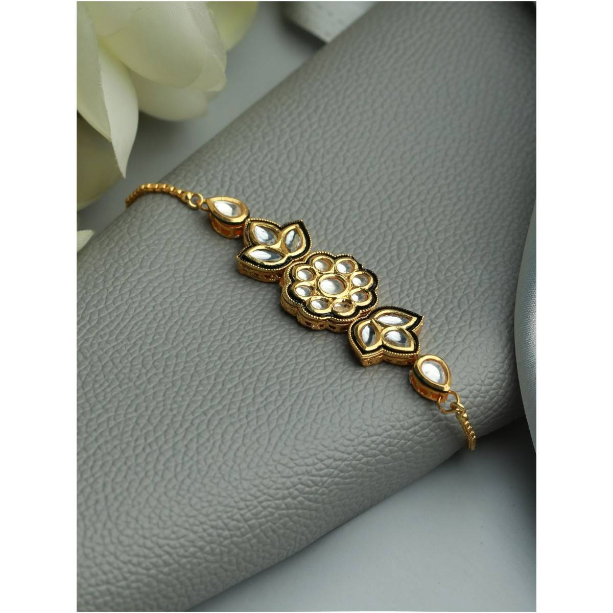 Aatmana Gold Plated Kundan Studded and Floral Pattern Black Adjustable Bracelet (2.6) · 2.6