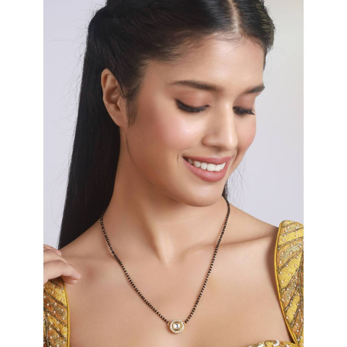 Aatmana Black & Gold Kundan Mangalsutra · One Size