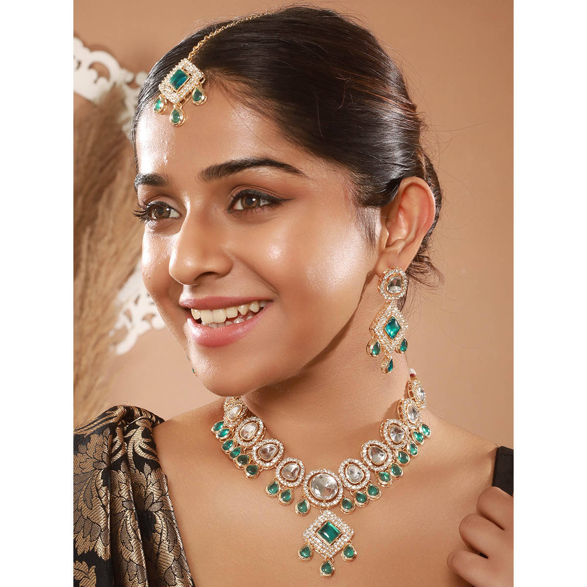 Aatmana Gold Plated Green Kundan Studded and Beaded Jewellery Set with Maangtikka