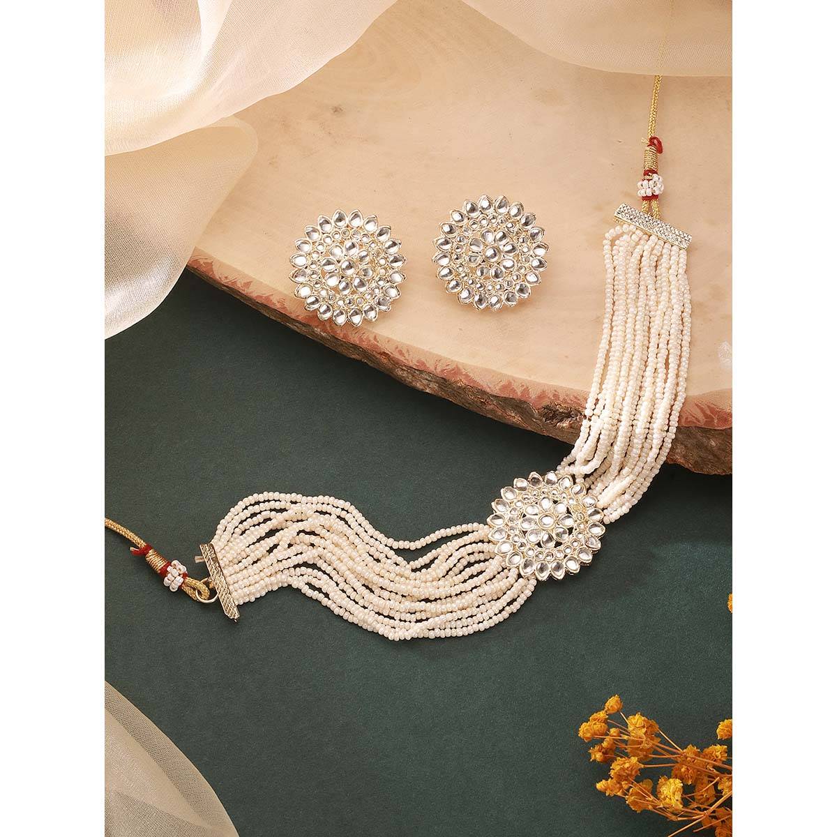 Aatmana Gold Plated Kundan Studded Beaded White Floral Necklace and Earrings · Adjustable