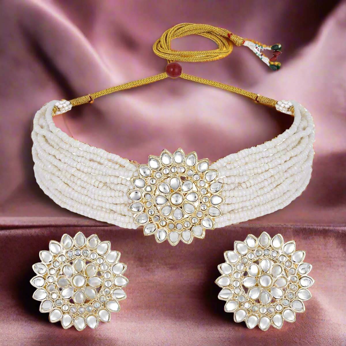 Aatmana Gold Plated Kundan Studded Beaded White Floral Necklace and Earrings
