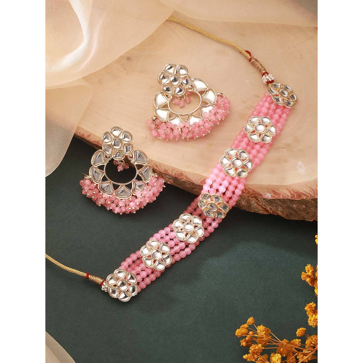 Aatmana Gold Plated Baby Pink Kundan Studded and Beaded Necklace and Earrings