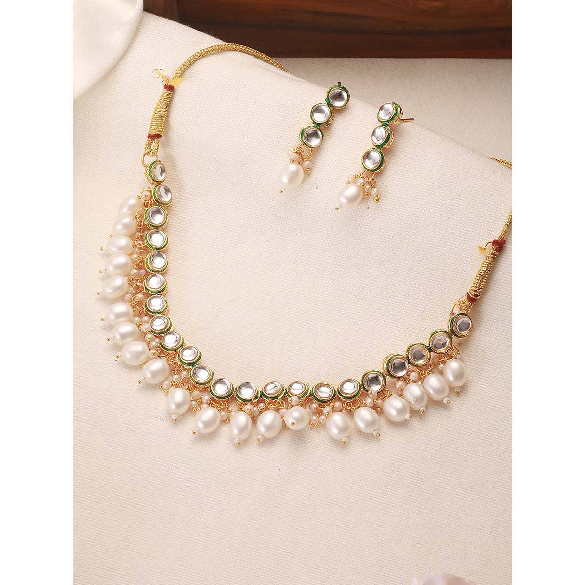 Aatmana Gold Plated Circular Kundan Studded Beaded Necklace with Earrings · Adjustable