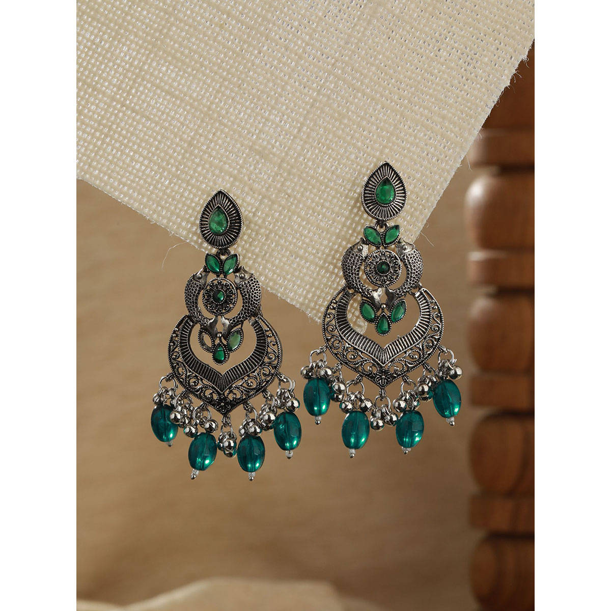 Aatmana Green Silver-Plated Kundan Studded Fish Shaped Chandbalis