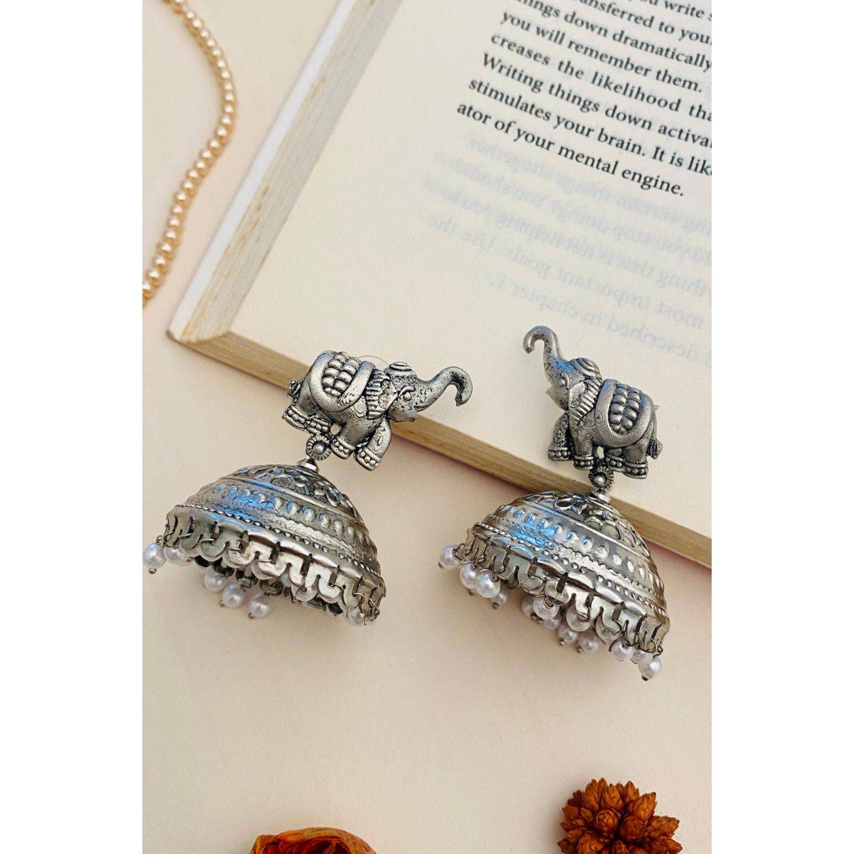 Abdesigns Graceful High Quality German Silver Jhumki Earrings · One Size