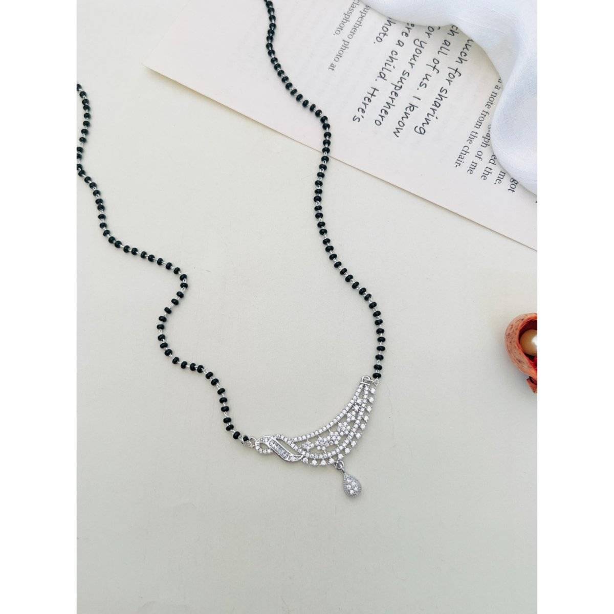 Abdesigns White Silver Plated American Diamond Studded Beaded Mangalsutra