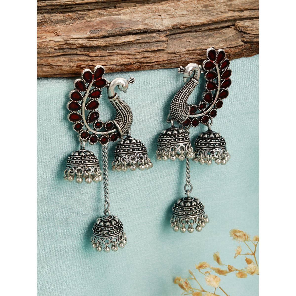 Aatmana Silver Plated Maroon Stone Studded Handcrafted Peacock Shaped Jhumkas Earrings