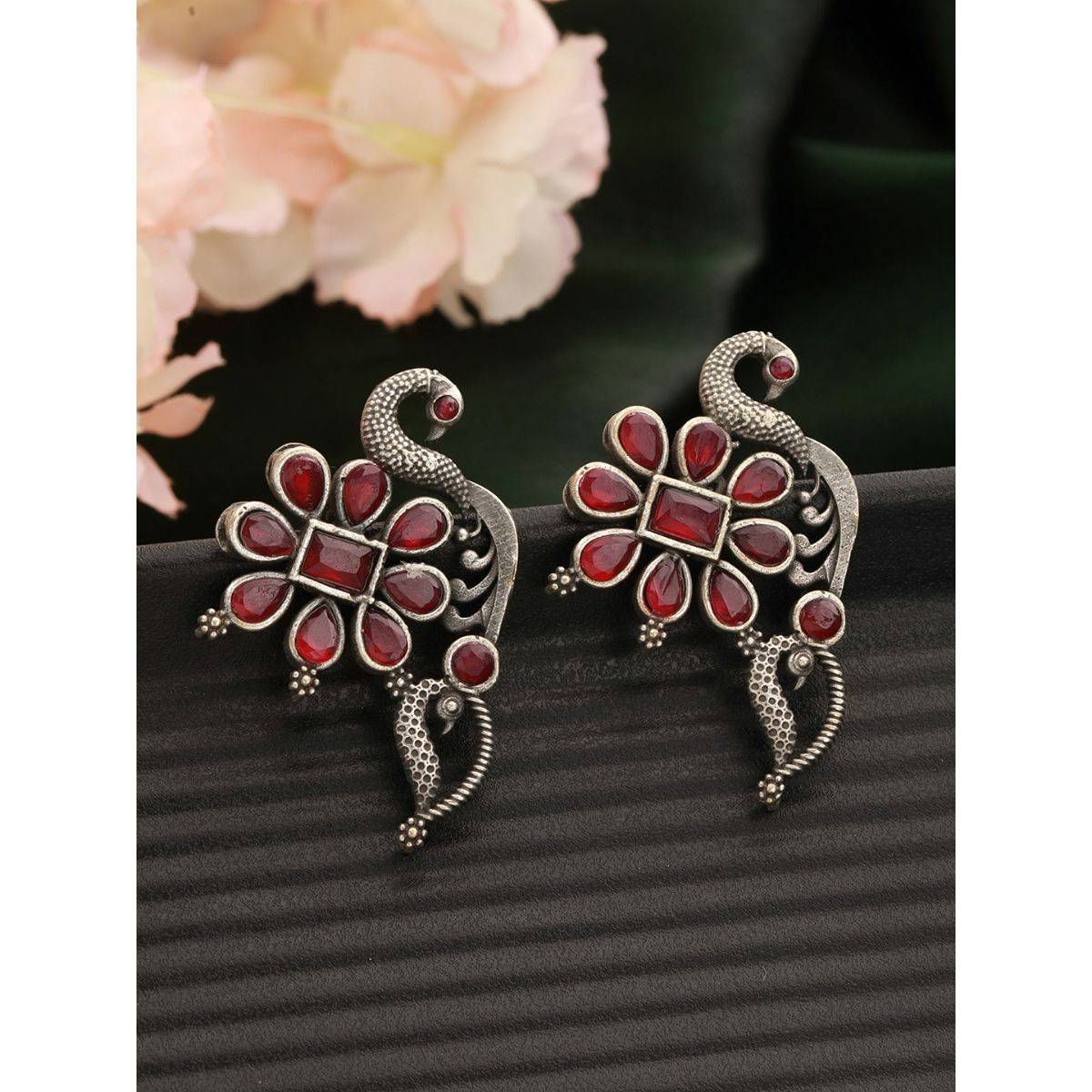 Aatmana Silver Plated & Red Stone Studded Oxidised Peacock Shaped Drop Earrings