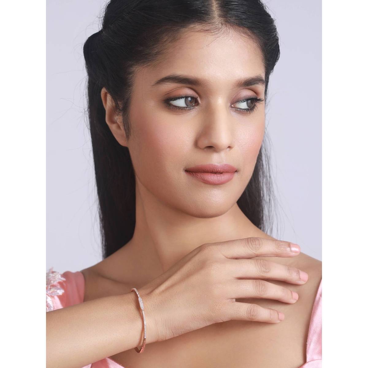 Aatmana Rose Gold Plated American Diamond Studded Elegant and Sleek Bracelet