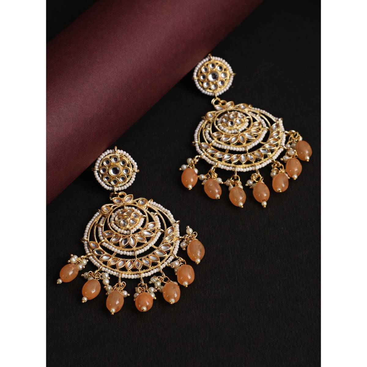Aatmana Gold Toned Pearl and Kundan Studded Crescent Shaped Chandbalis · One Size