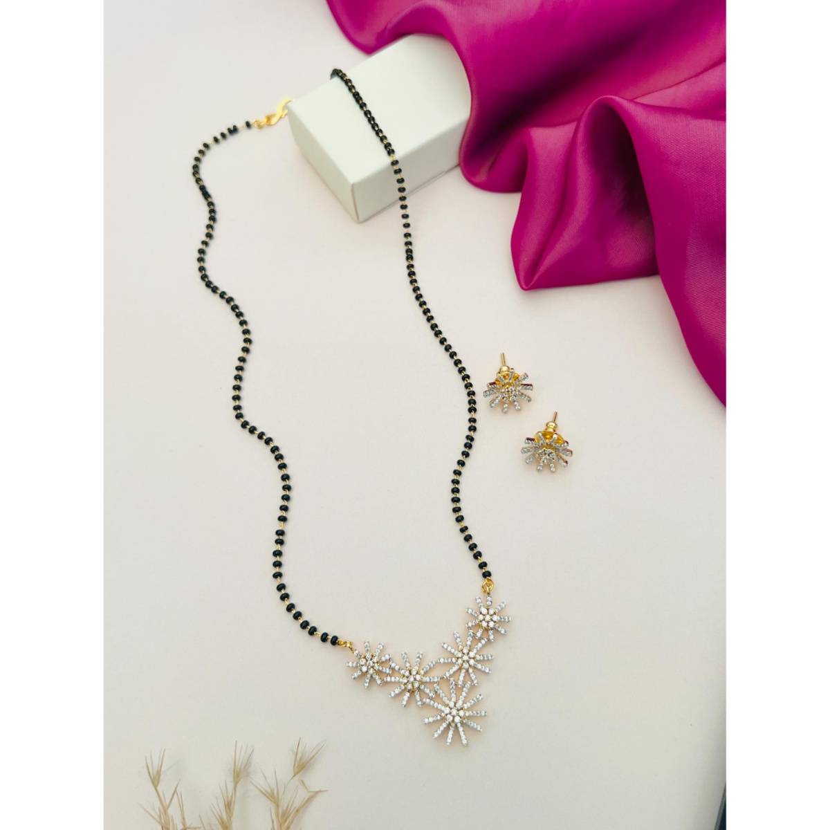 Abdesigns White Silver Plated American Diamond Studded Mangalsutra with Earrings