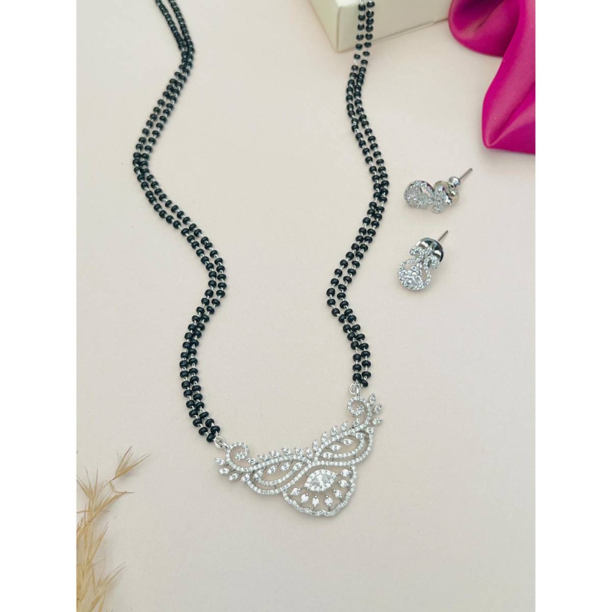 Abdesigns White Silver Plated American Diamond Studded Mangalsutra with Earrings