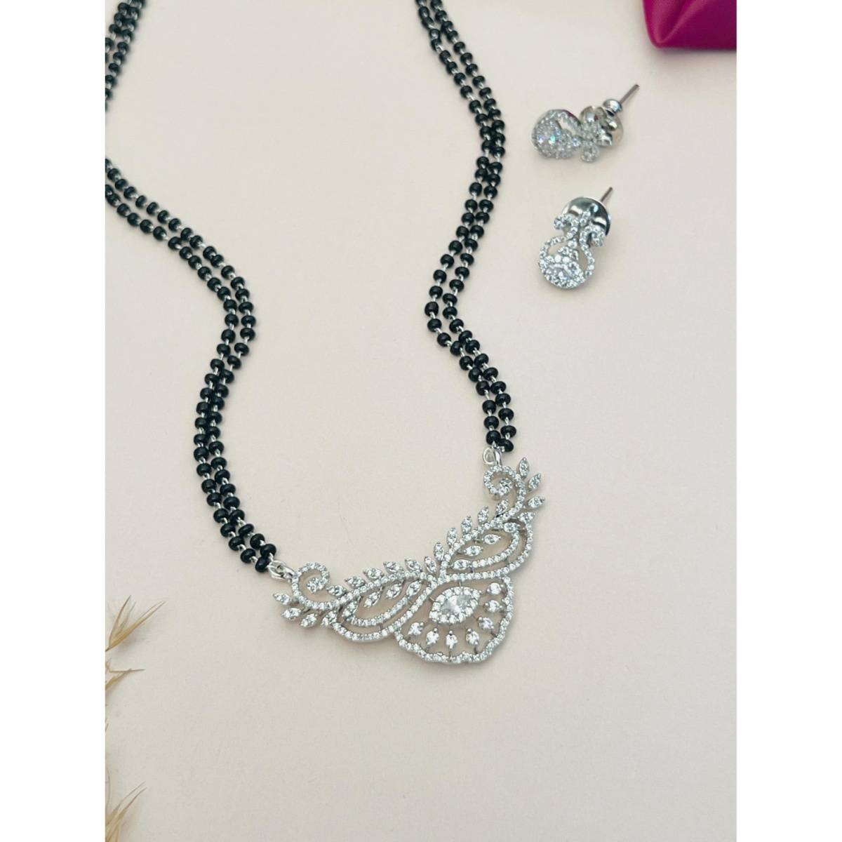 Abdesigns White Silver Plated American Diamond Studded Mangalsutra with Earrings