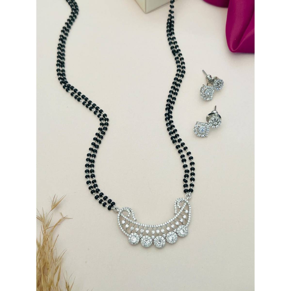 Abdesigns White Silver Plated American Diamond Studded Mangalsutra with Earrings