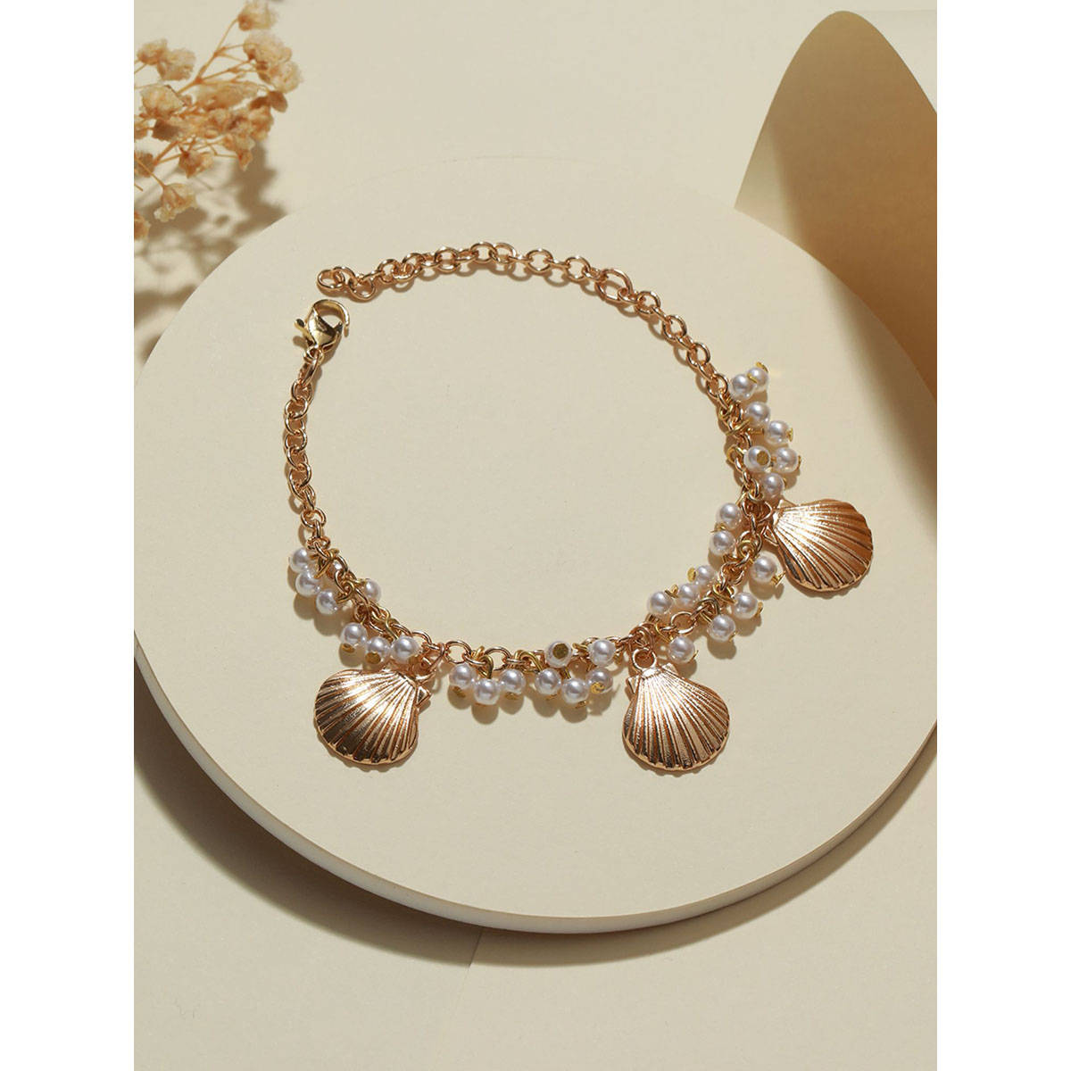 Aatmana Gold plated Western Style Shell Shaped & Pearl Beaded Bracelet