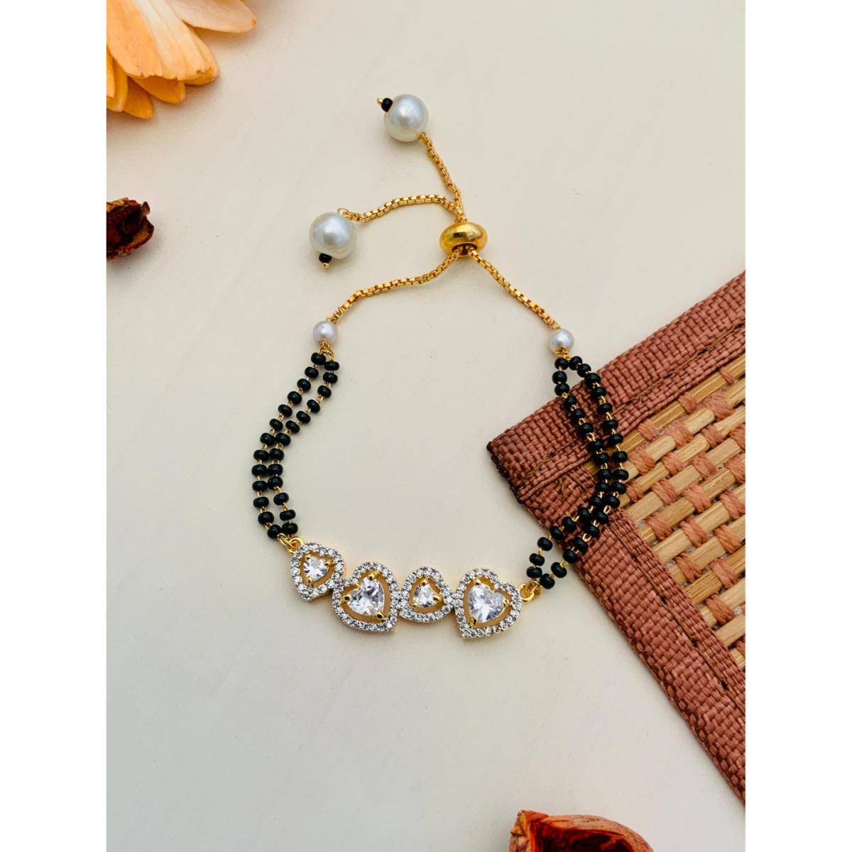 Abdesigns Sparkling Gold Plated Heart Hand Mangalsutra · One Size