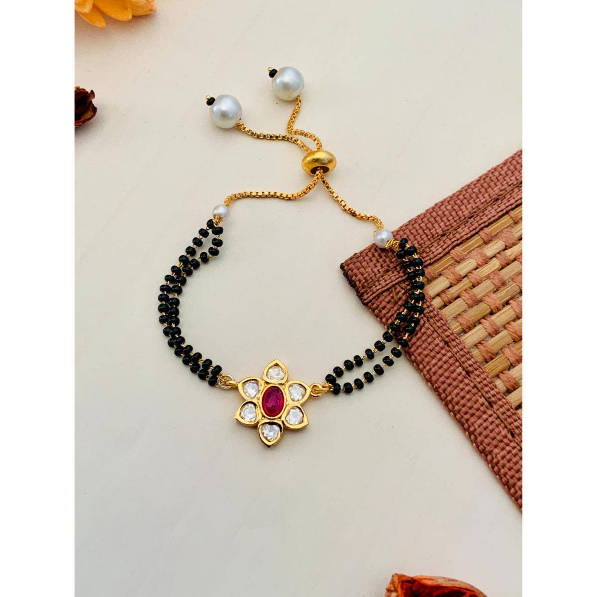 Abdesigns Gold Plated Pink Kundan Flower Hand Mangalsutra