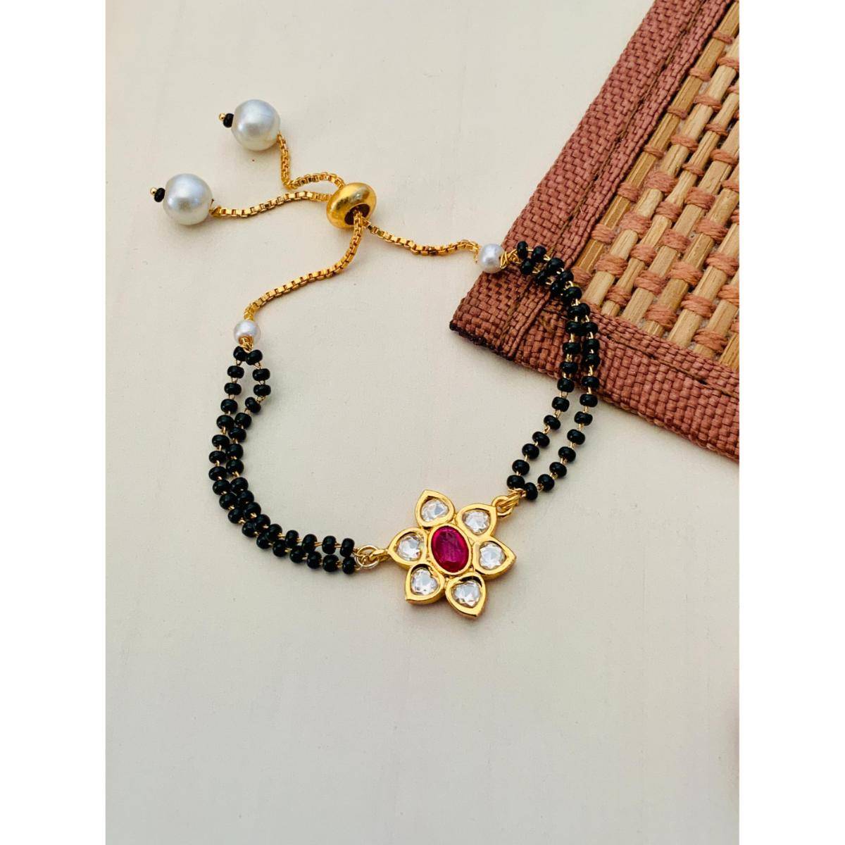Abdesigns Gold Plated Pink Kundan Flower Hand Mangalsutra