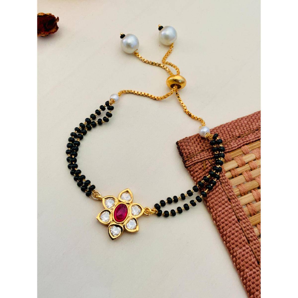Abdesigns Gold Plated Pink Kundan Flower Hand Mangalsutra