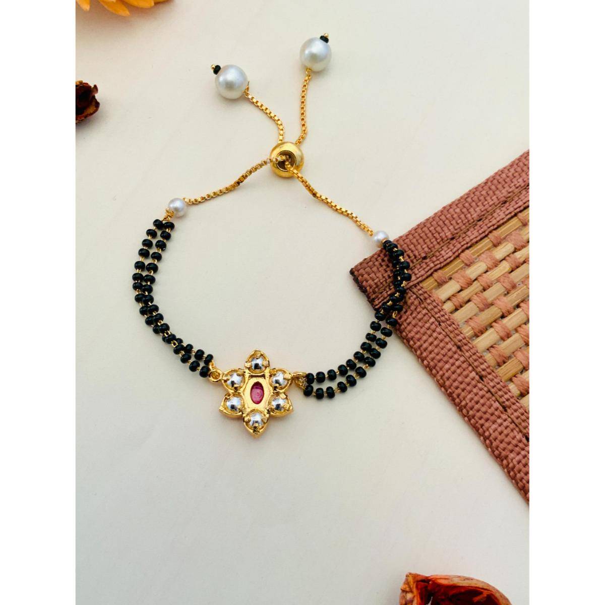 Abdesigns Gold Plated Pink Kundan Flower Hand Mangalsutra