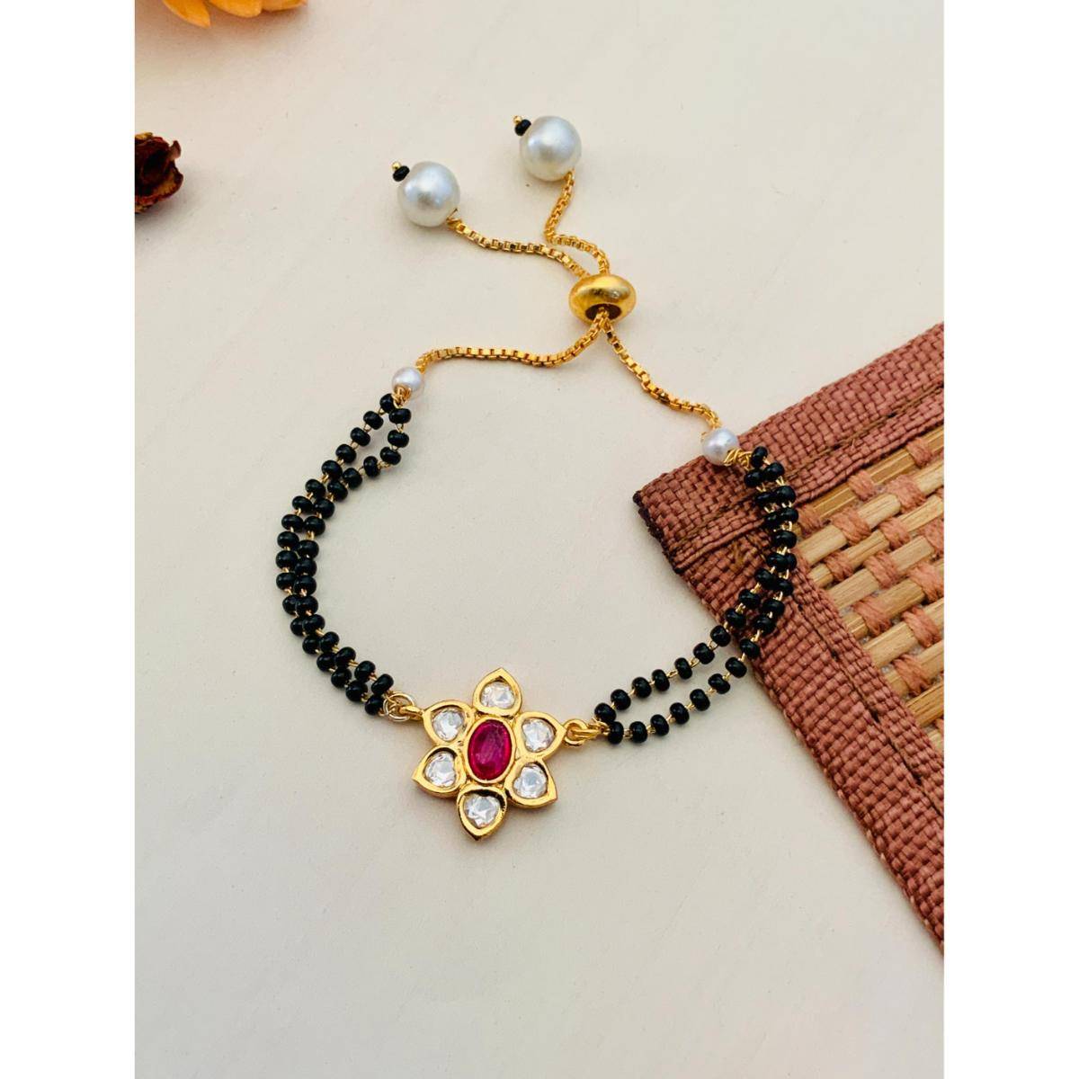 Abdesigns Gold Plated Pink Kundan Flower Hand Mangalsutra