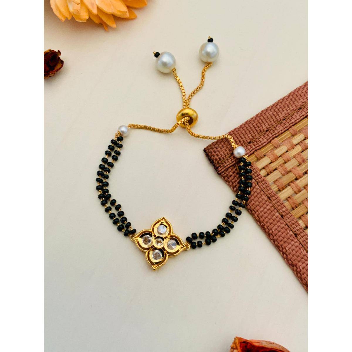 Abdesigns Gold Plated White Flower Kundan Hand Mangalsutra