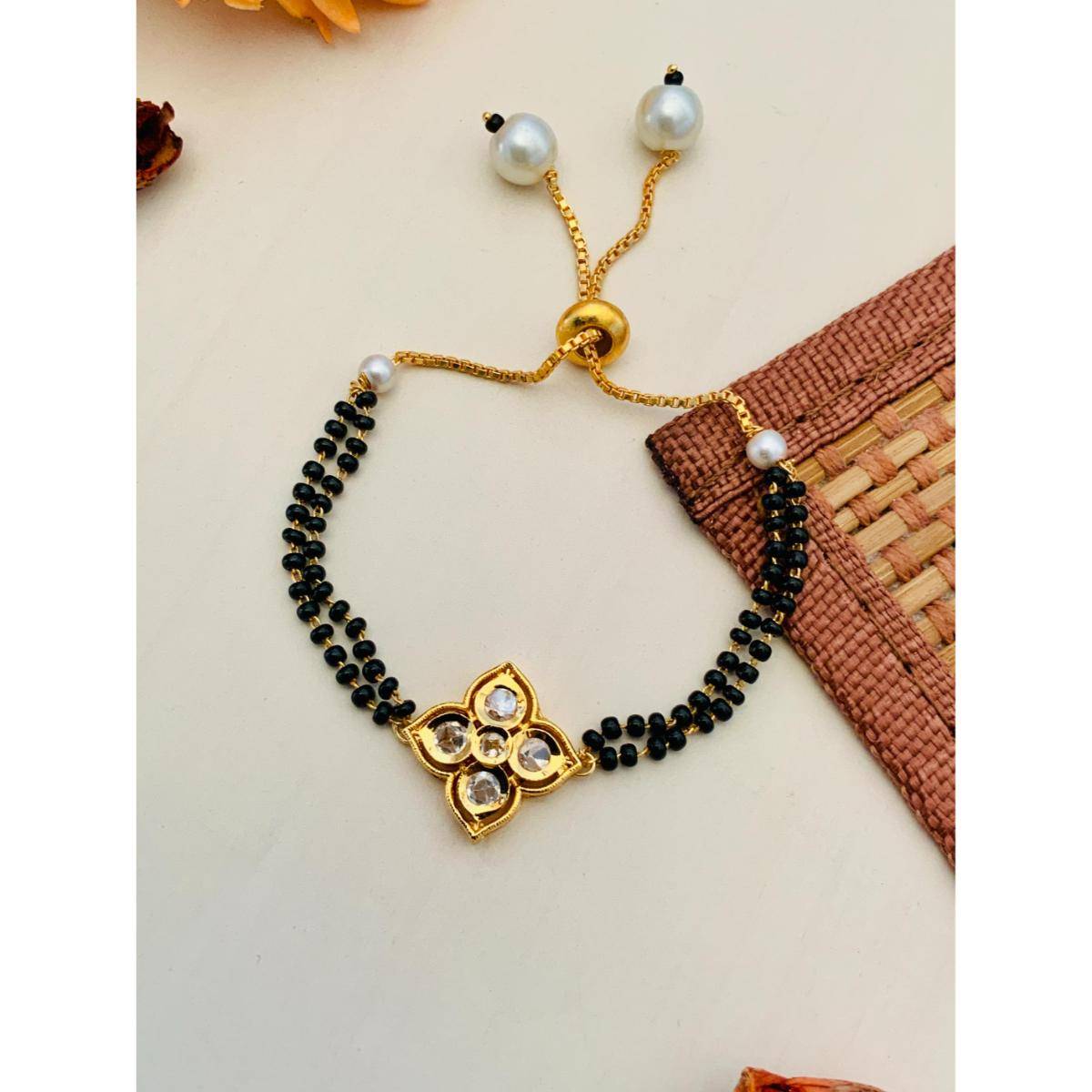 Abdesigns Gold Plated White Flower Kundan Hand Mangalsutra