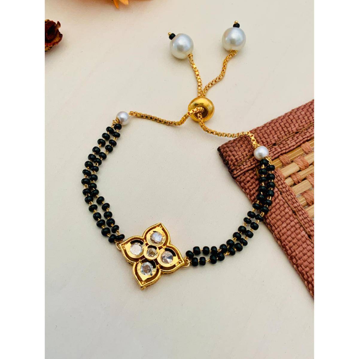 Abdesigns Gold Plated White Flower Kundan Hand Mangalsutra