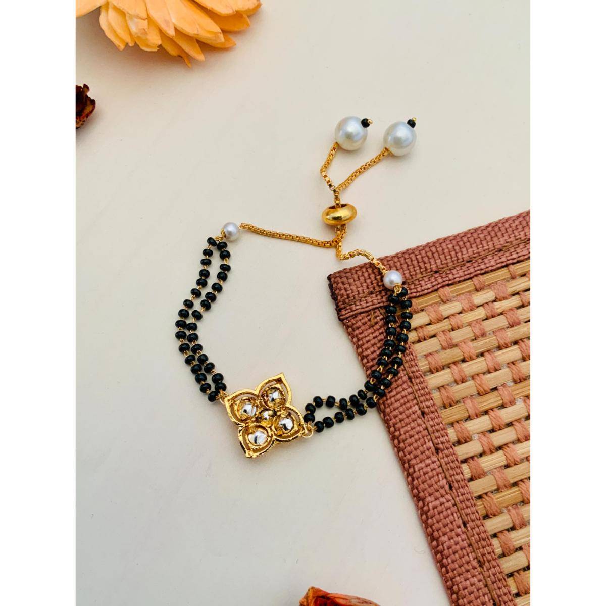 Abdesigns Gold Plated White Flower Kundan Hand Mangalsutra