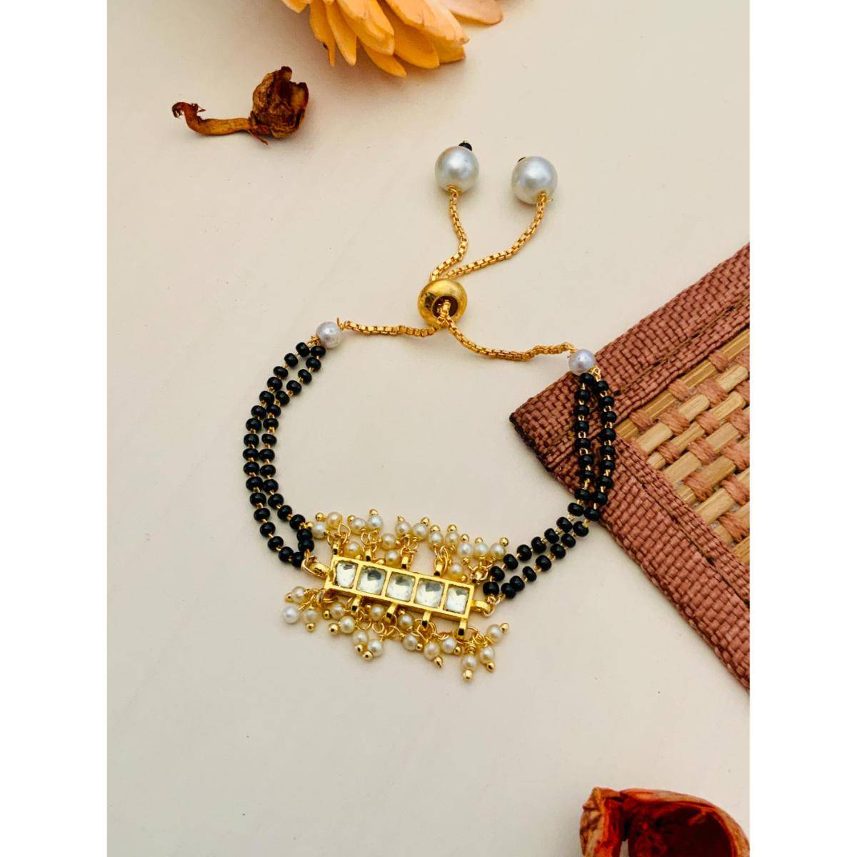 Abdesigns Pleasing Gold Plated Pachi Kundan Hand Mangalsutra · One Size