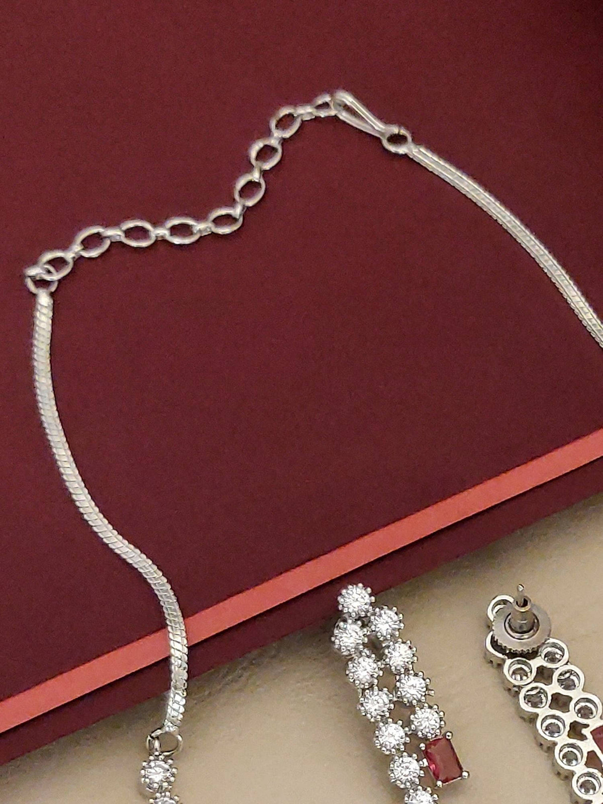 Abdesigns Red Enchanting Silver Plated American Diamond Studded Necklace with Earrings