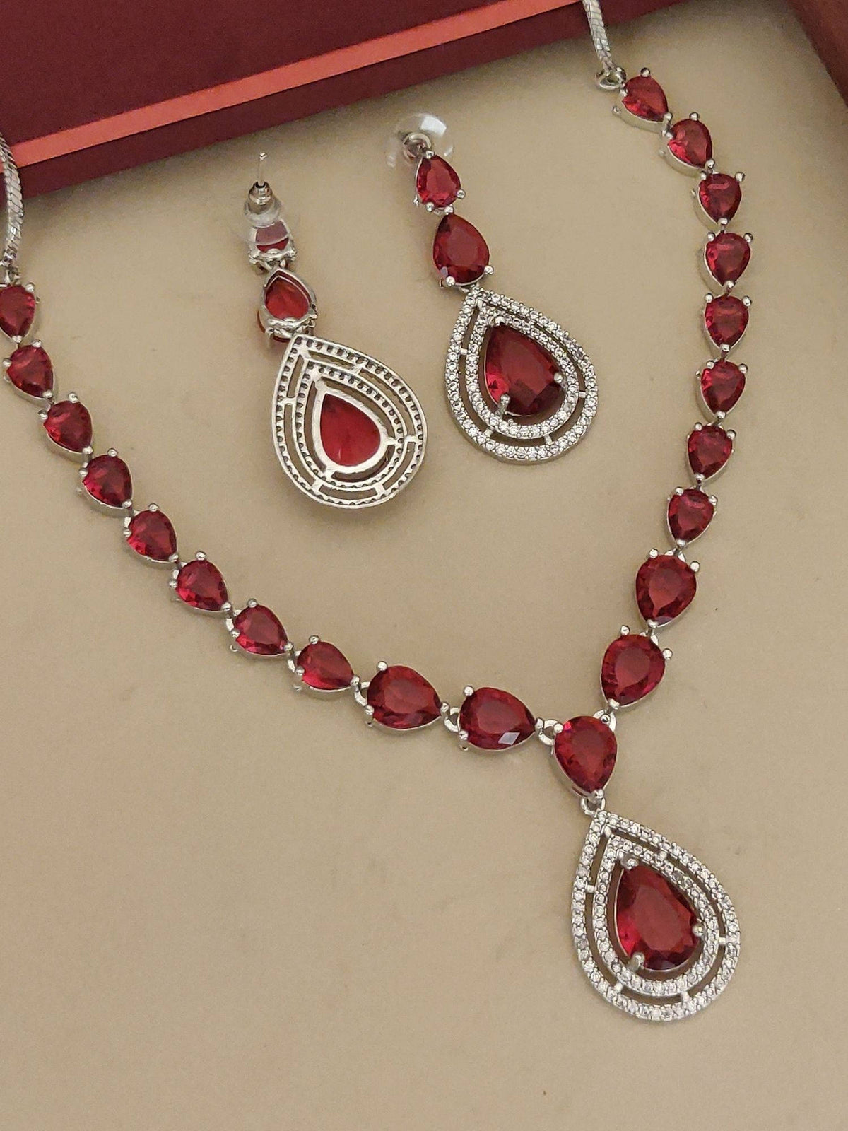 Abdesigns Red Elegant Silver Plated Flower American Diamond Necklace with Earrings