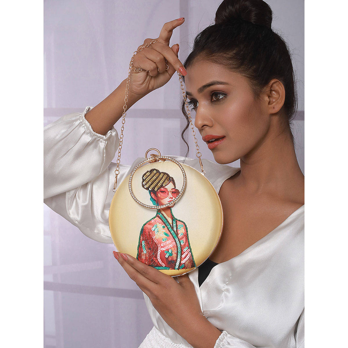 Aatmana Embroidered Sequined Round Clutch