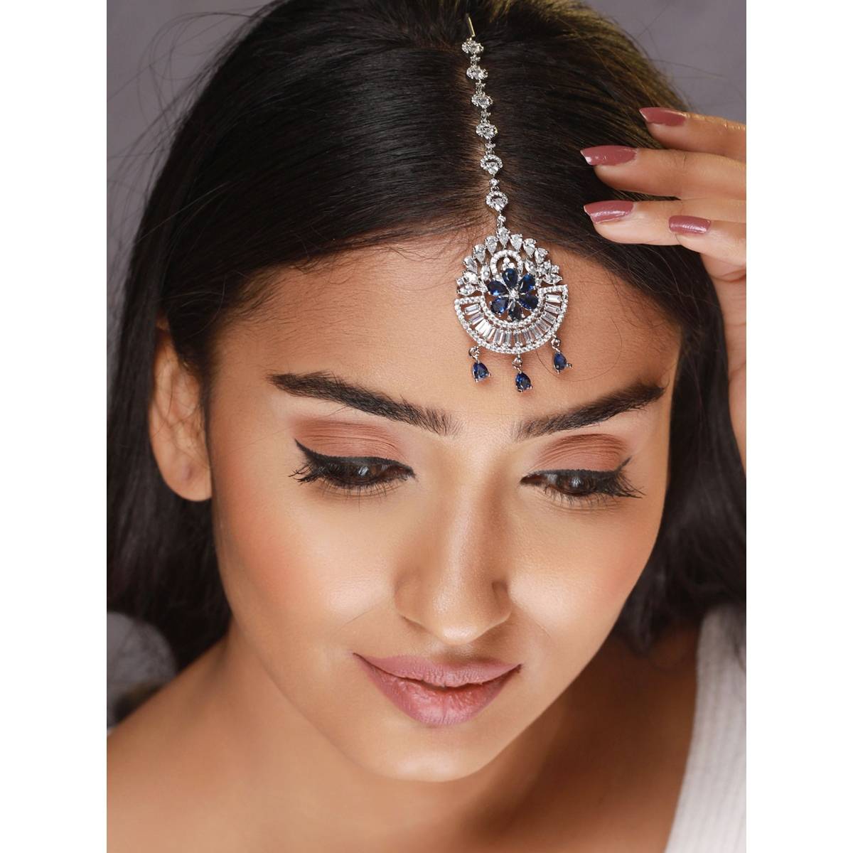 Aatmana Rhodium Plated Blue & White Ad Studded Floral Maangtikka