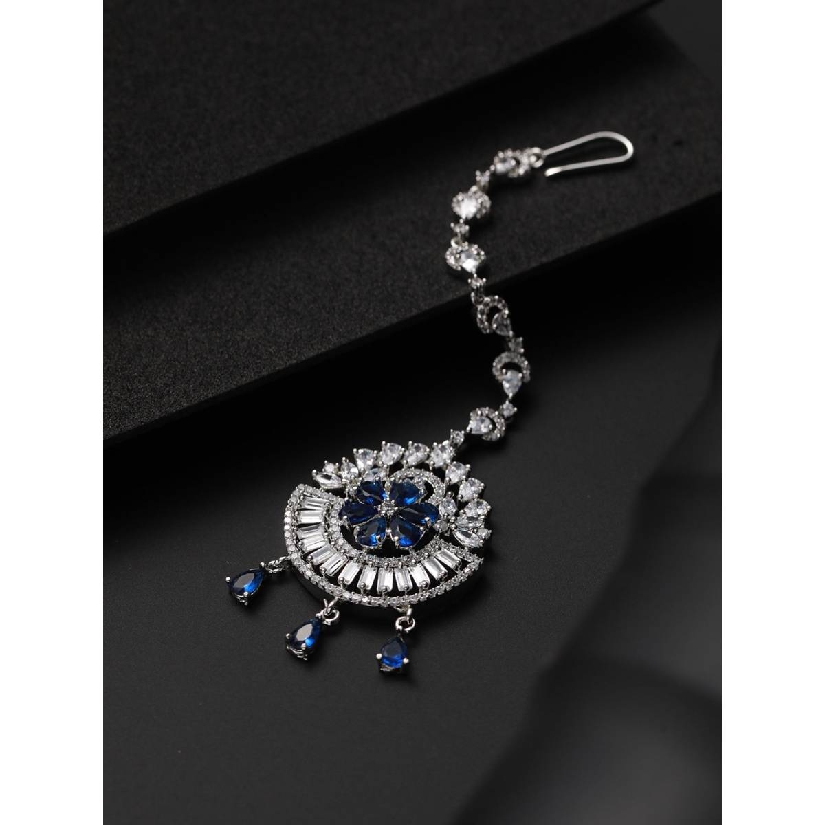 Aatmana Rhodium Plated Blue & White Ad Studded Floral Maangtikka