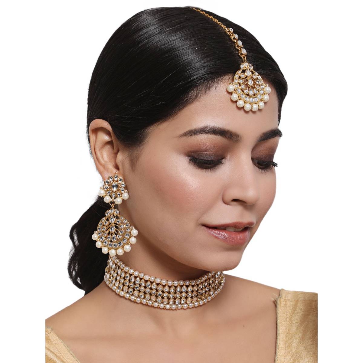 Aatmana Gold Toned Kundan & Pearl Jewellery Set